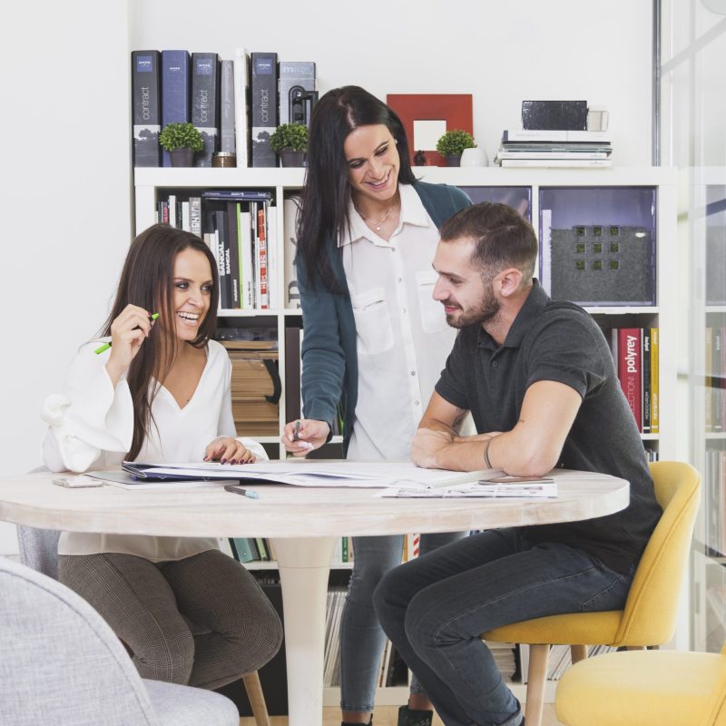 cheerful-coworkers-desk-office